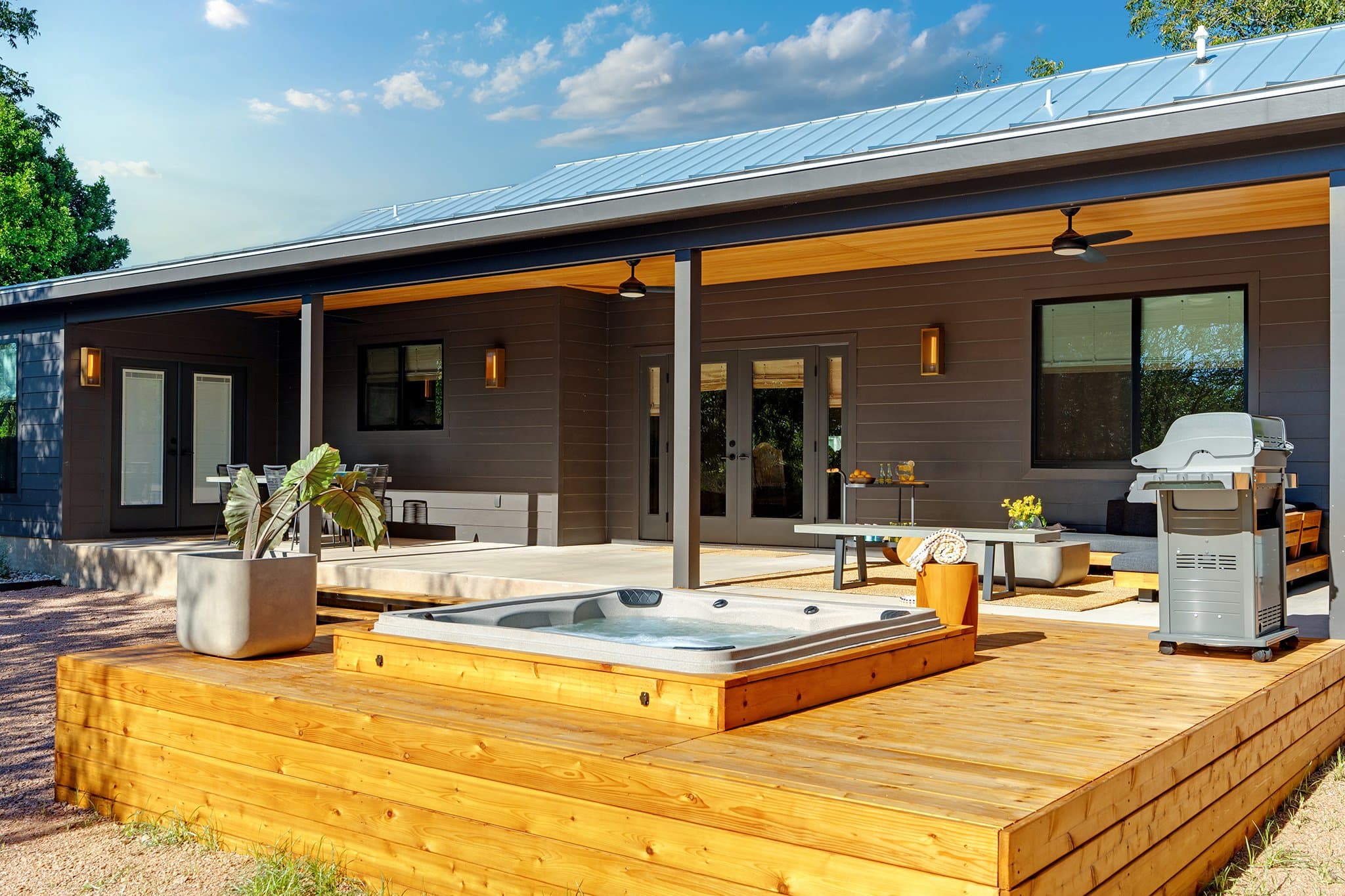 Private hot tub and covered outdoor patio at Casa Alegre Fredericksburg Texas